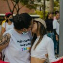lesbian women kissind during festival
