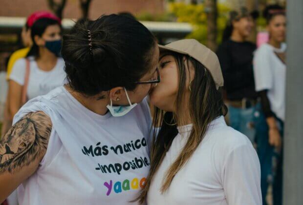 lesbian women kissind during festival