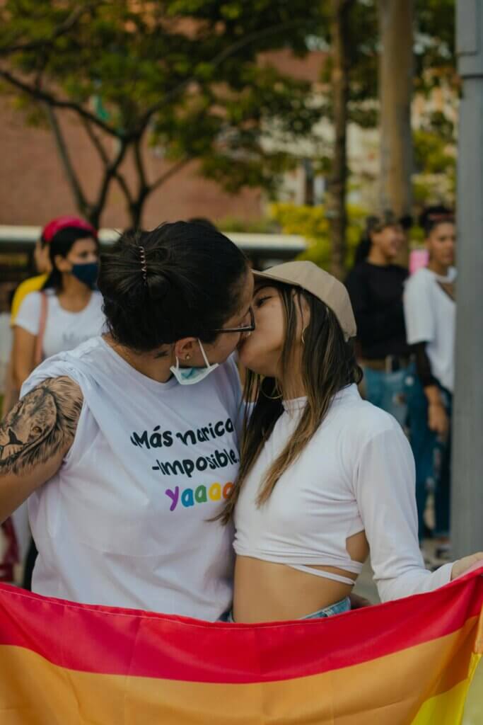 lesbian women kissind during festival