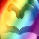 lgbtq+ colors with hands making the heart shape