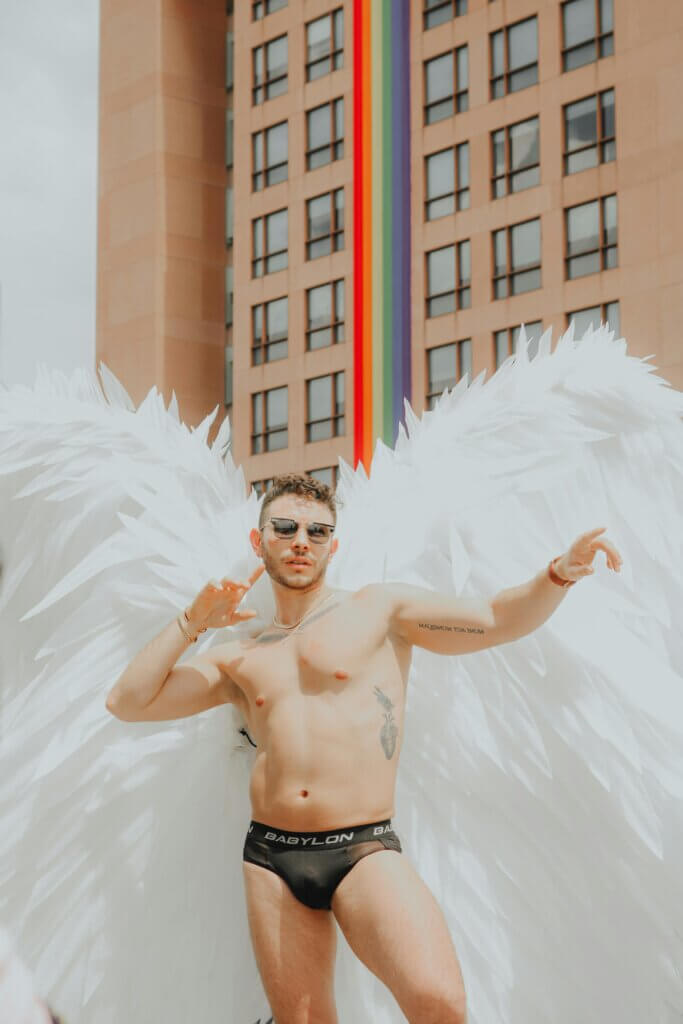 LGBTQ+ person dressed as angel on Athens Gay Pride