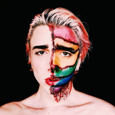 lgbtq+ person with half-painted face